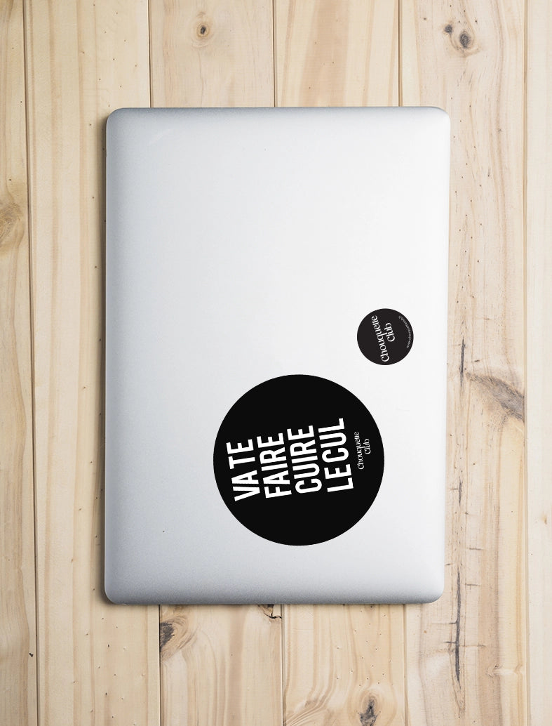 Sticker « Va te faire cuire le cul » noir sur un laptop